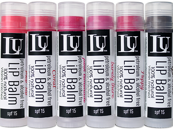 Six tinted LU lip balms in a row