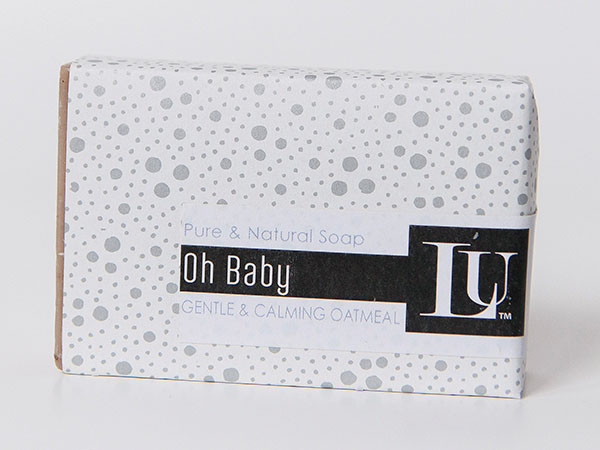 Oh Baby gentle calming oatmeal bar soap in a grey polka-dot wrap